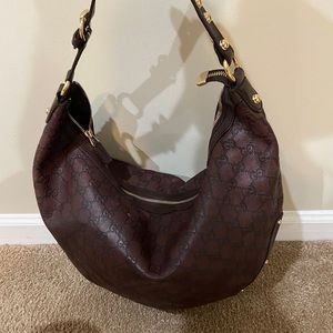 Authentic Gucci hobo leather bag with gold studs